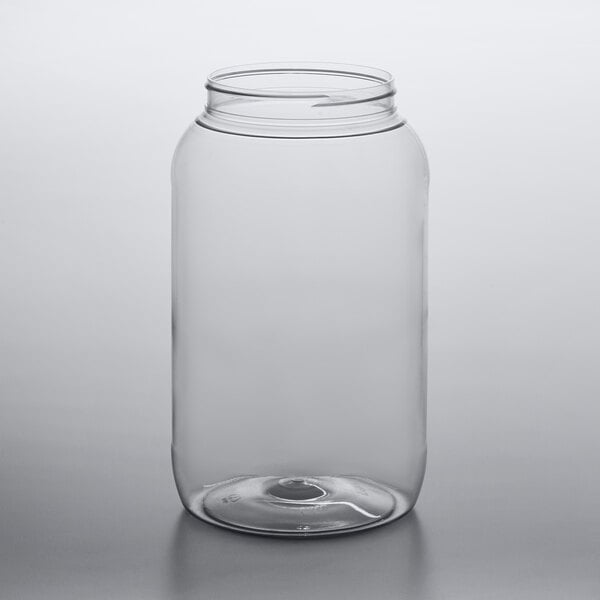 A large clear round PET plastic jar with a wide mouth opening.