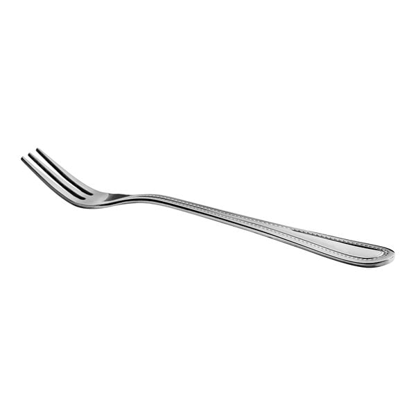 A stainless steel cocktail or oyster fork with a simple, beaded edge design.