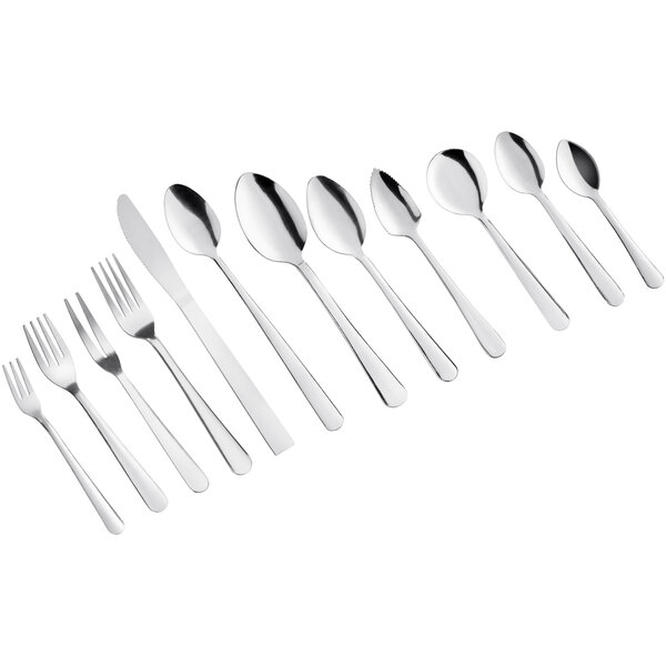 A set of stainless steel flatware including forks, knives, and various spoons arranged in a row.