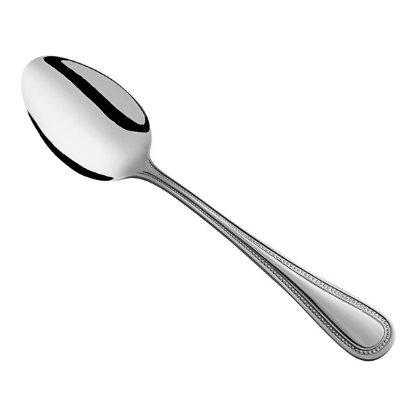 A stainless steel medium weight dinner or dessert spoon with a simple beaded edge design.