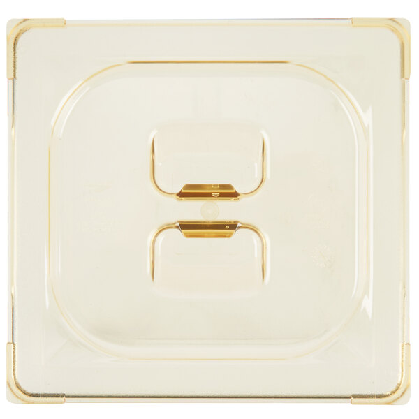 A Vollrath Super Pan 1/6 size amber plastic lid with a handle.
