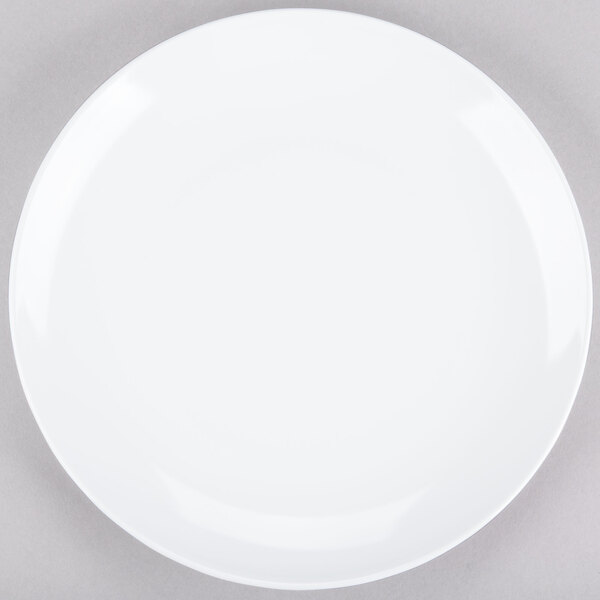 A white GET Siciliano plate with a white rim on a gray surface.