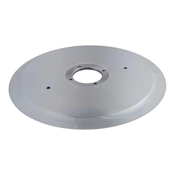 A round, metallic disc with a central hole and several smaller holes arranged around it.