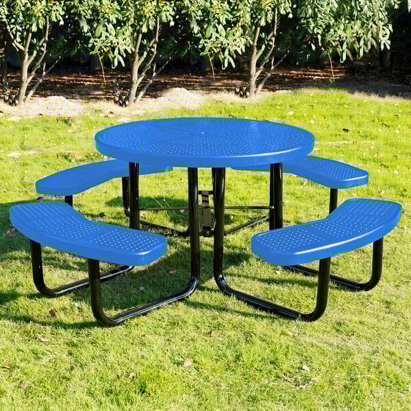 A round blue perforated metal picnic table with four attached curved benches.