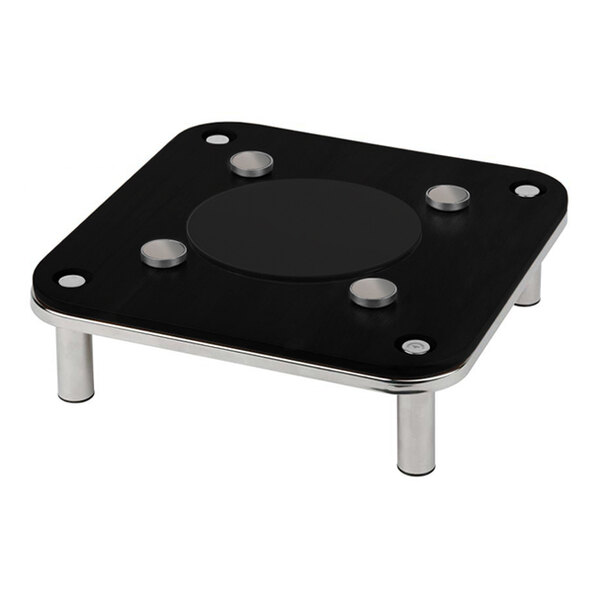A square black induction warmer with a magnetic platform and metal stand.