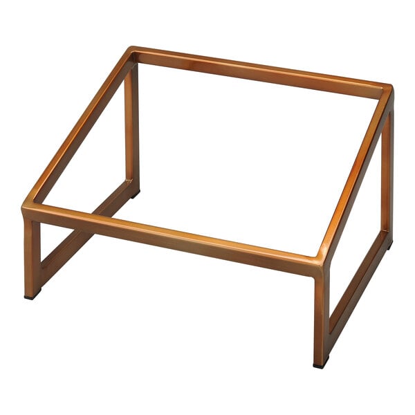 A copper-colored stainless steel slanted riser for buffet displays.