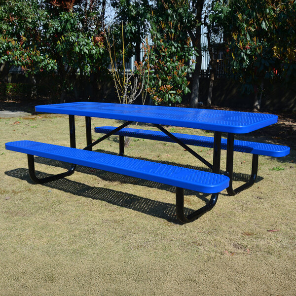 A blue perforated metal picnic table with attached benches and black metal legs, designed for outdoor use.