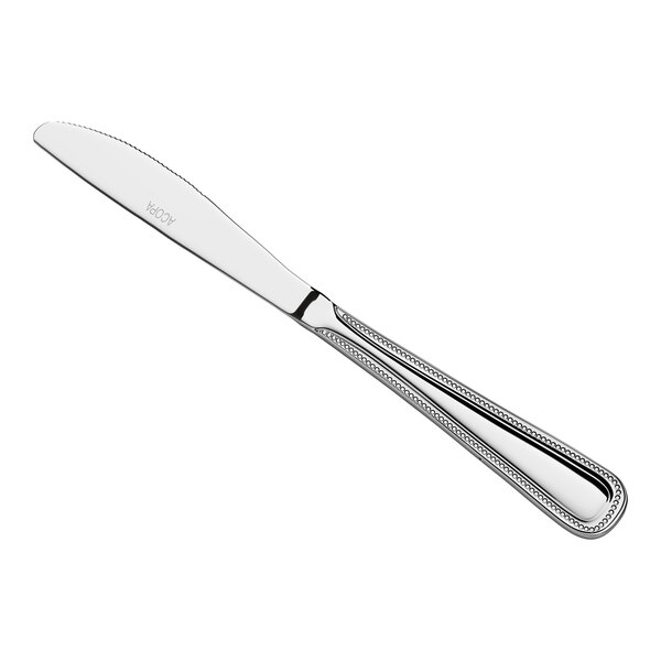 A stainless steel dinner knife with a decorative handle.