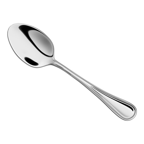 A stainless steel tablespoon or serving spoon with a decorative handle.