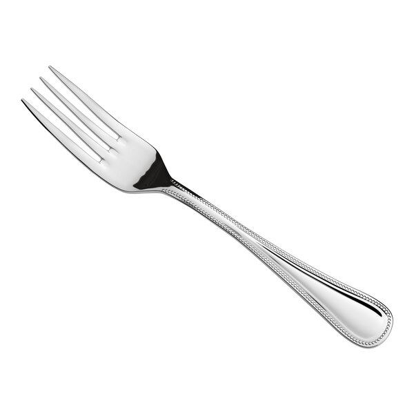 A stainless steel European dinner fork with a decorative handle.
