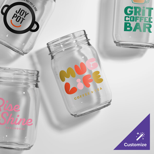 A set of clear plastic mason jars with customizable printed designs on the front.