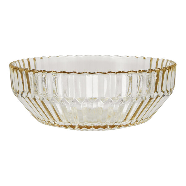 A round glass cereal bowl with a ribbed design and a ginger gold tint.
