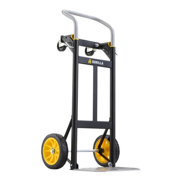 A steel convertible hand truck with two large yellow wheels and a metal frame.