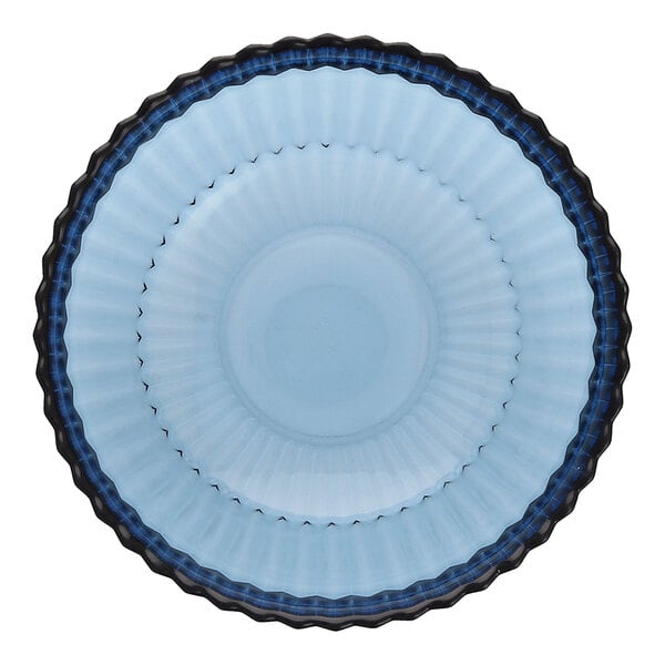 A round cornflower blue glass cereal bowl with a fluted design and dark rim.