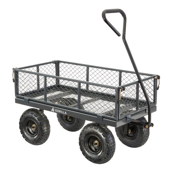 A steel utility cart with mesh sides, four large wheels, and a pull handle.
