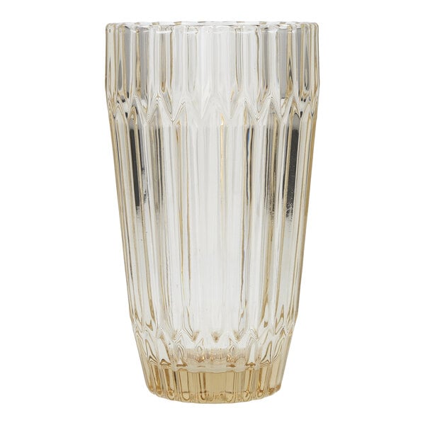 A clear, ginger gold round beverage glass with a textured vertical pattern.