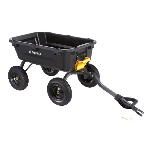 A heavy-duty black poly yard dump cart with four wheels and a pull handle.