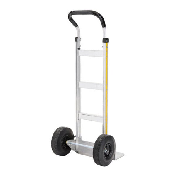 A silver aluminum hand truck with black handles and two large black wheels.