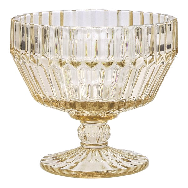 A round, ginger gold glass footed dessert bowl with a textured, ribbed design.