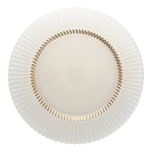 A round glass charger plate with a fluted design and a gold accent ring near the center.