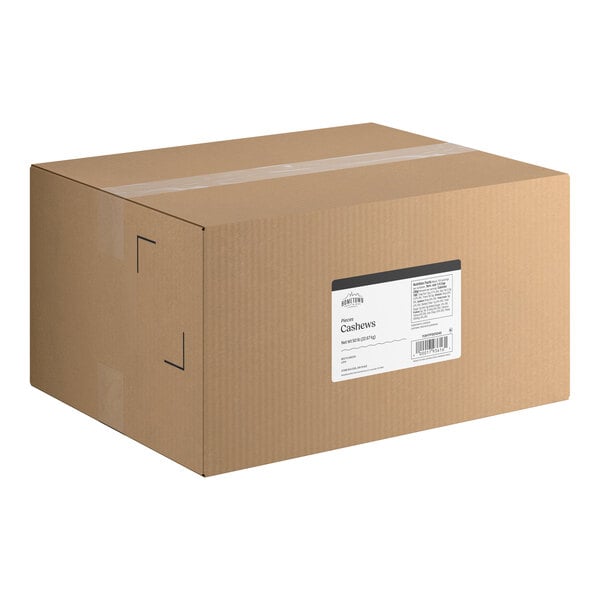 A large sealed cardboard box with a white product label on the side.