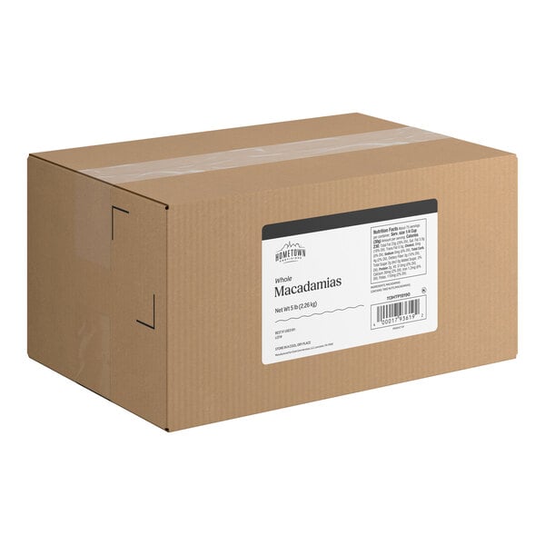 A large brown cardboard box with a white label indicating it contains whole macadamias.