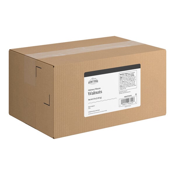 A large brown cardboard box with a white label indicating it contains walnut halves and pieces.