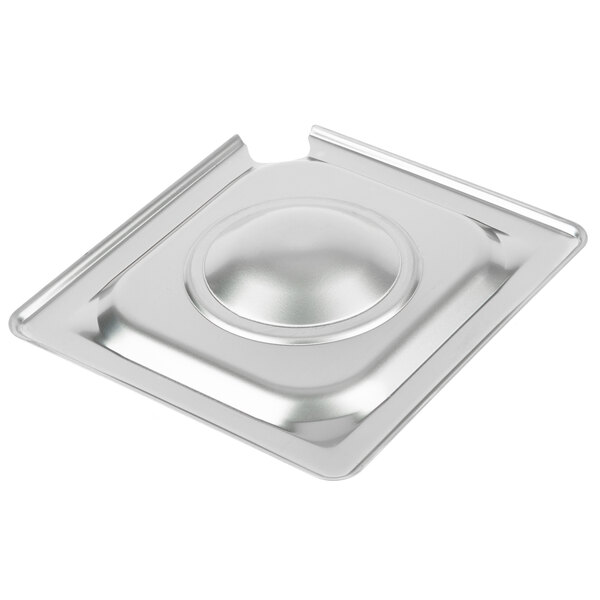 A Vollrath stainless steel slotted lid on a stainless steel pan.