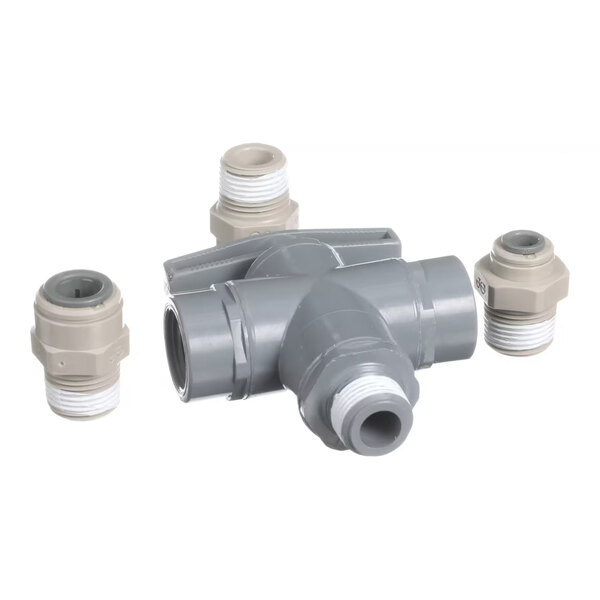A gray and beige plastic flush valve assembly with four threaded fittings.