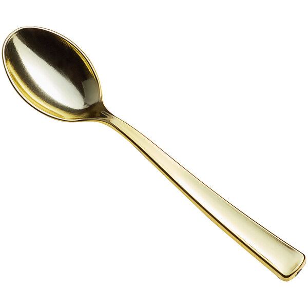 A gold plastic petite tasting spoon.