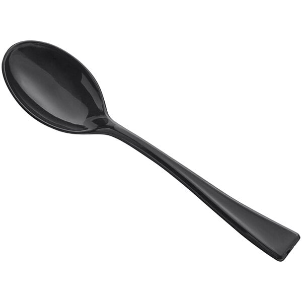 A small black plastic tasting spoon.
