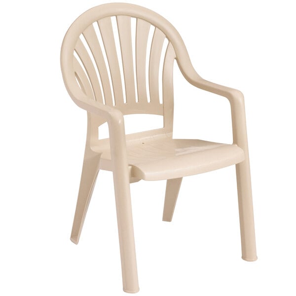 A white Grosfillex resin armchair with arms.
