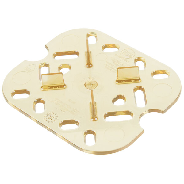 A Vollrath amber high heat drain tray with holes.