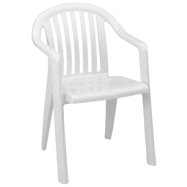 A case of 16 white Grosfillex Miami lowback stacking resin armchairs with armrests.