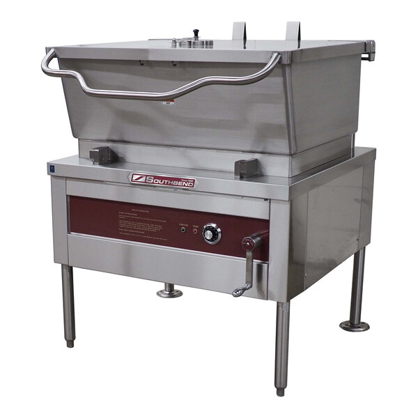 A large stainless steel 40-gallon liquid propane manual tilt skillet used for commercial cooking.