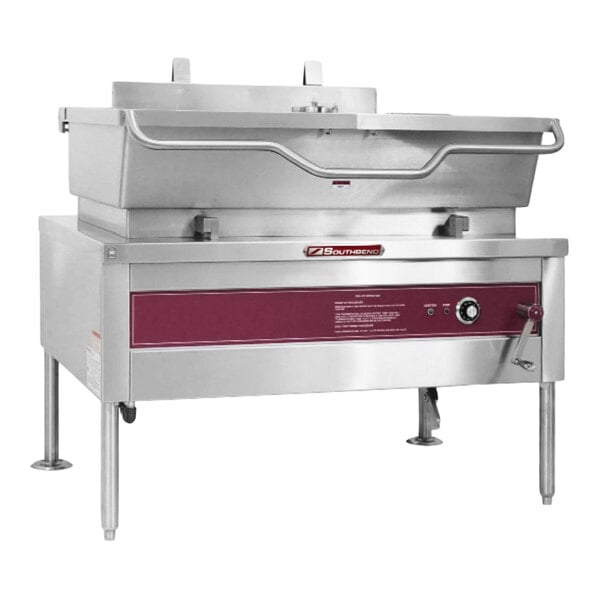A large stainless steel 30-gallon electric manual tilt skillet with a front control panel and sturdy legs.