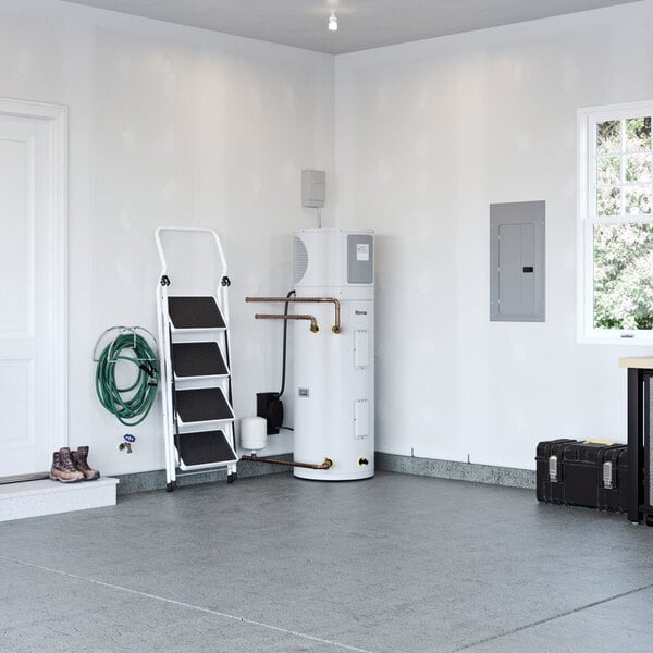 A 65-gallon Rinnai electric indoor hybrid heat pump water heater installed in a garage.