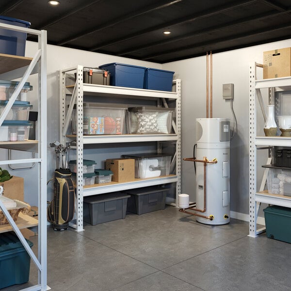 An 80-gallon electric indoor hybrid heat pump water heater installed in a garage or utility room.