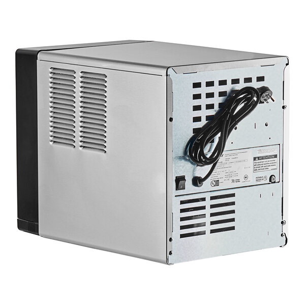 Follett 7CI114A-NW-NF-ST-00 Champion 7 Series Air-Cooled Chewblet Countertop Ice Maker and Dispenser with 7 lb. Bin - 115V, 100 lb.