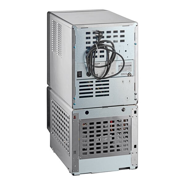 Follett 7UD114A-NW-CL-ST-00 Champion 7 Series ADA Height Air-Cooled Chewblet Undercounter Ice Maker and Dispenser with 7 lb. Bin and Filter - 115V, 100 lb.