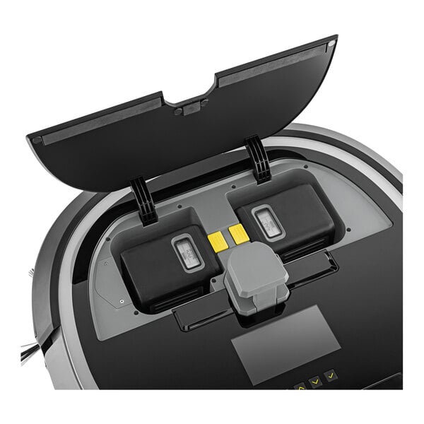 A cordless robotic vacuum with its top lid open, showing two batteries and a charger inside.