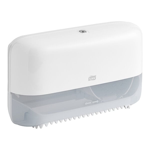 A white Tork Elevation OptiServe coreless high-capacity double roll toilet tissue dispenser.