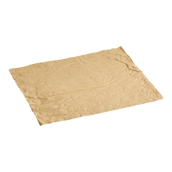 A rectangular, crumpled beige sheet is shown on a white background.