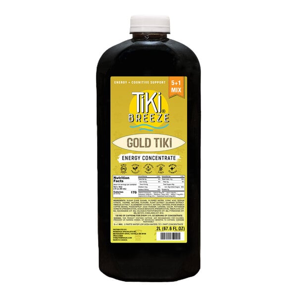 A 2-liter bottle of Tiki Breeze Gold Tiki Energy Concentrate with a yellow label.