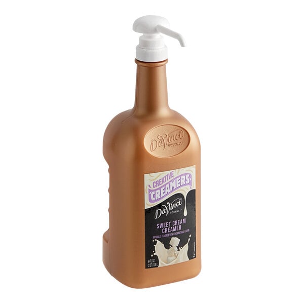 A 64 fl. oz. bottle of DaVinci Gourmet Sweet Cream Creamer with a pump dispenser.