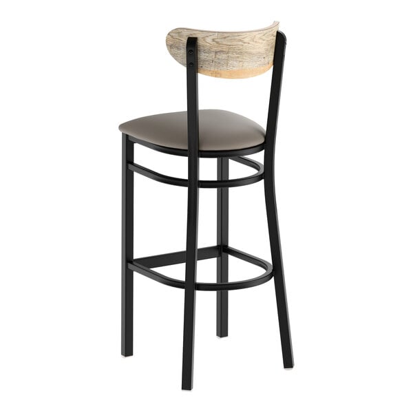 A black metal bar stool with a dark gray vinyl seat and a driftwood-finished wooden backrest.