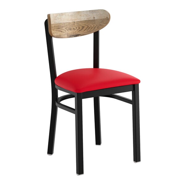 A black metal chair with a red vinyl seat and a driftwood-finished wooden backrest.