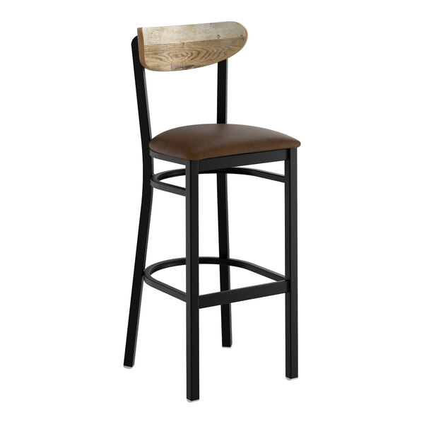 A black metal bar stool with a dark brown vinyl seat and a driftwood-finished wooden backrest.