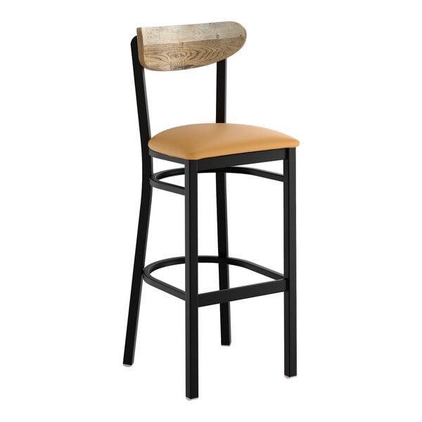 A black metal bar stool with a light brown vinyl seat and a driftwood-finished wooden backrest.