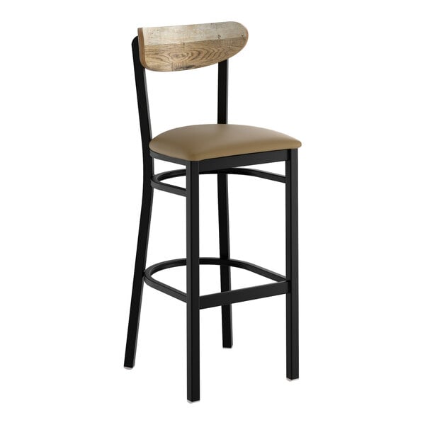A black metal bar stool with a taupe vinyl seat and a driftwood-finished wooden backrest.